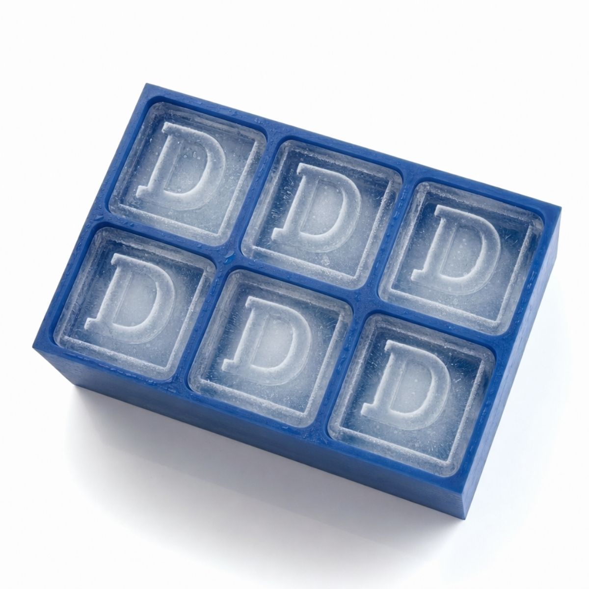 Blue custom silicone ice tray with raised D letters – perfect for personalised milestone gifting and cocktail nights