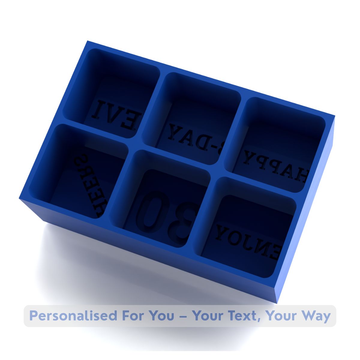 Blue silicone mold with pre-engraved letters on a white background