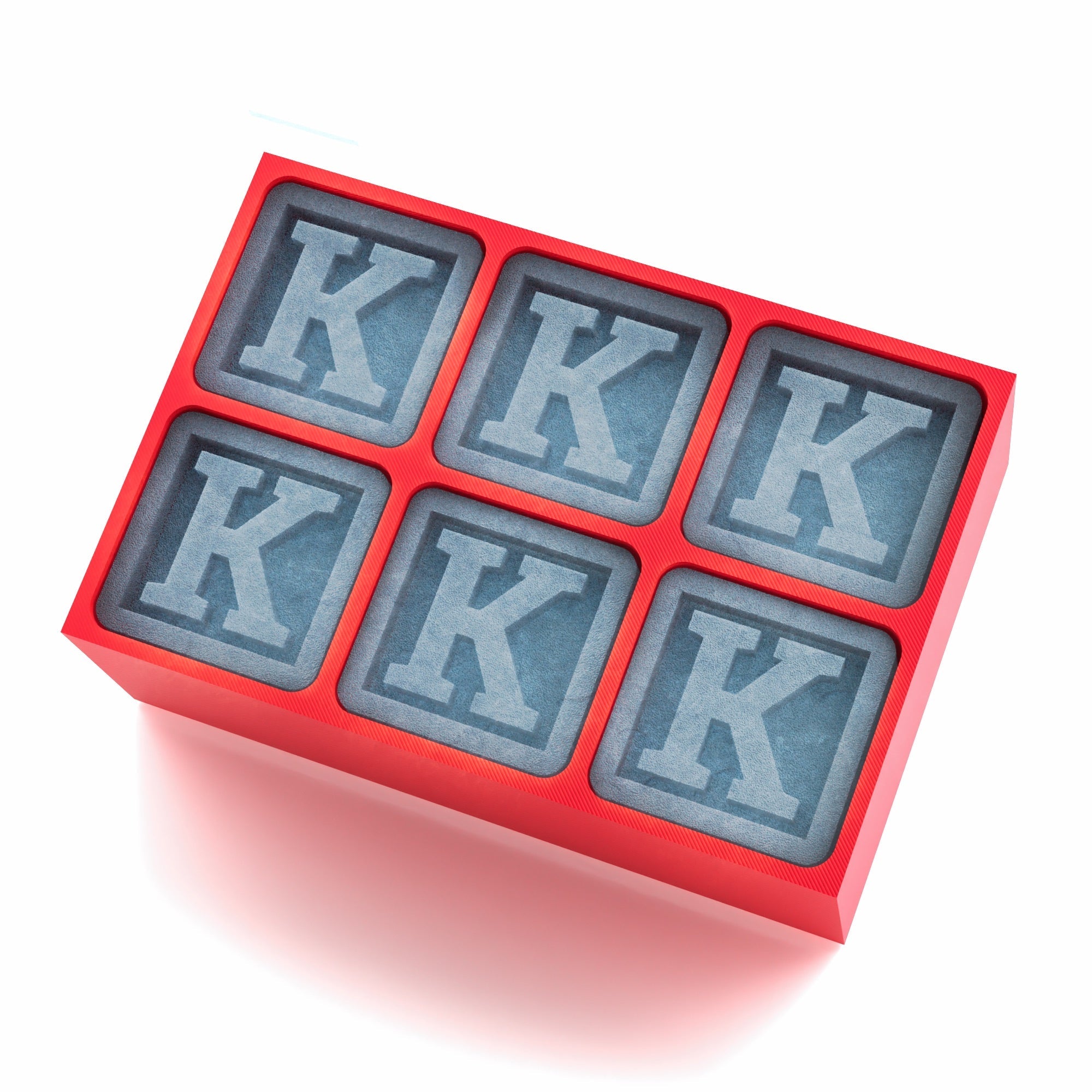 Bright red tray with custom K letter ice moulds, a standout gift idea for any special occasion
