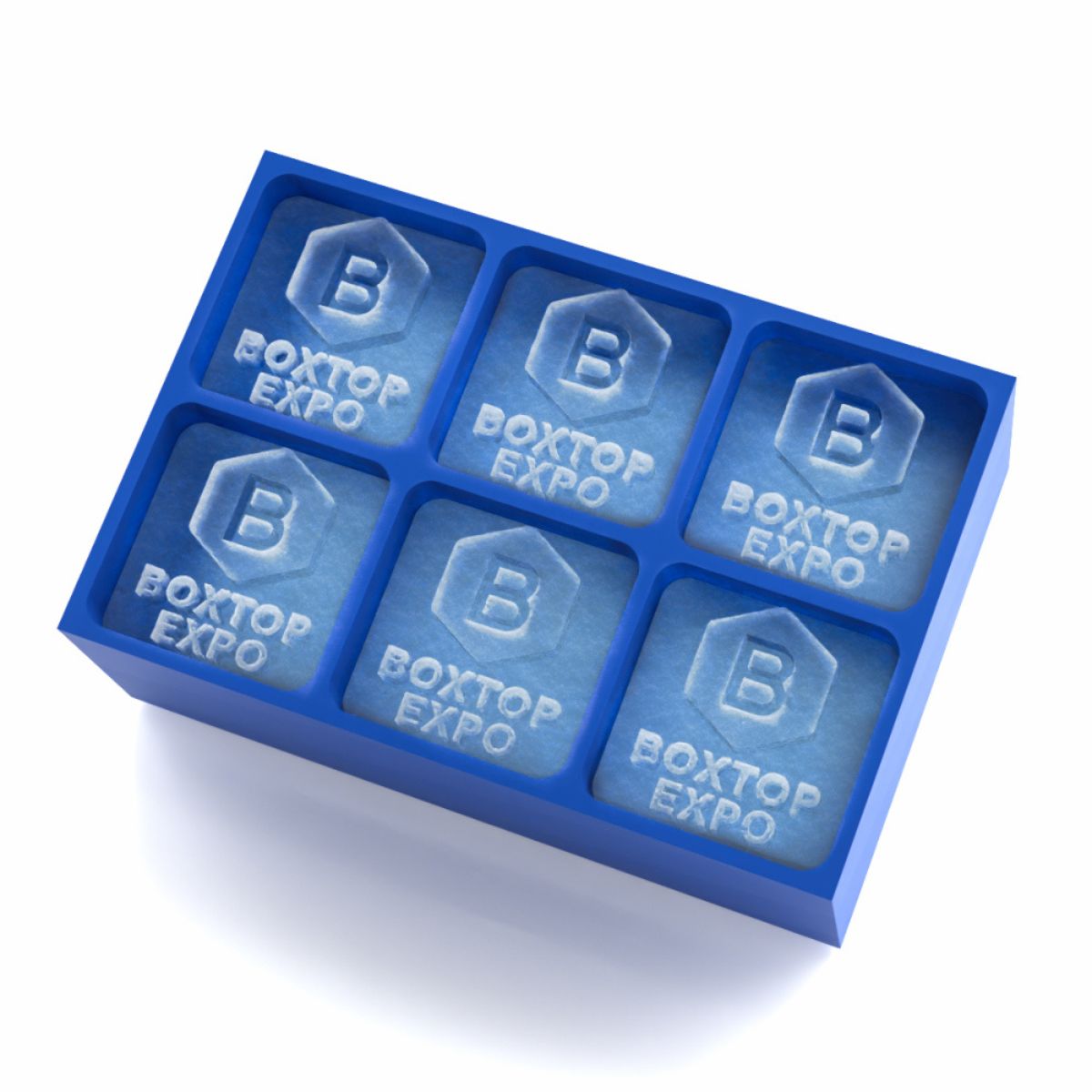 Royal blue six cube silicone ice tray filled with 45 mm logo ice cubes showing the Boxtop Expo hexagon B and wordmark for trade shows and conferences.
