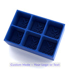 Blue custom silicone ice tray with six large cube cavities, engraved with “Your Logo” example, showing personalisation option.