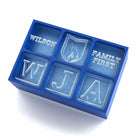 Blue custom ice tray featuring 'Wilson', 'Family First', initials WJA and family crest ice cube designs – perfect for personalised family gifts.