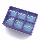 Purple 6-cube silicone ice tray with custom raised lettering: HAPPY B'DAY LEVI, 30, CHEERS, ENJOY – a unique 30th birthday gift idea