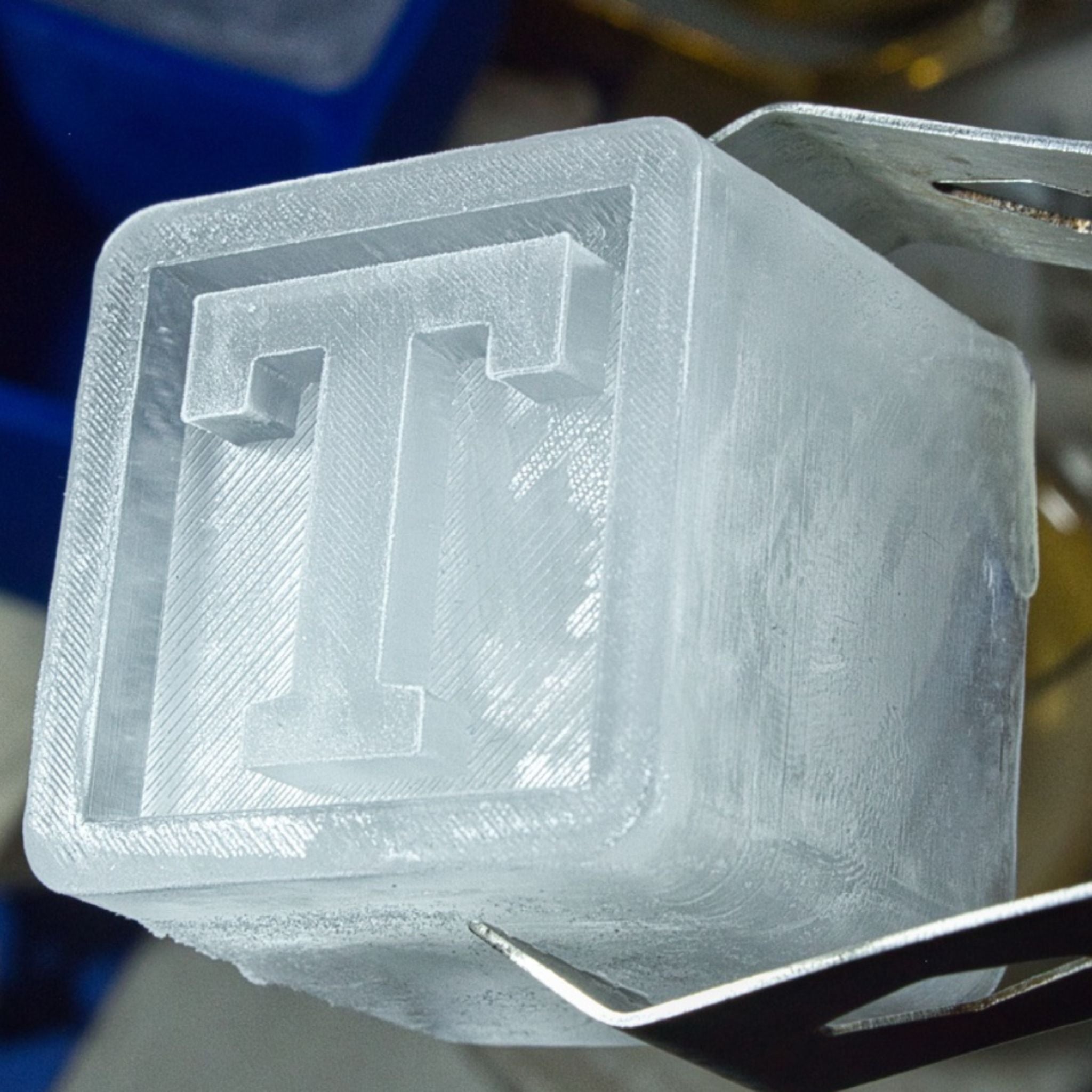 Macro shot of a ‘T’ letter ice cube – shows the craftsmanship and uniqueness of this personalised ice tray gift.