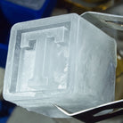 Macro shot of a ‘T’ letter ice cube – shows the craftsmanship and uniqueness of this personalised ice tray gift.