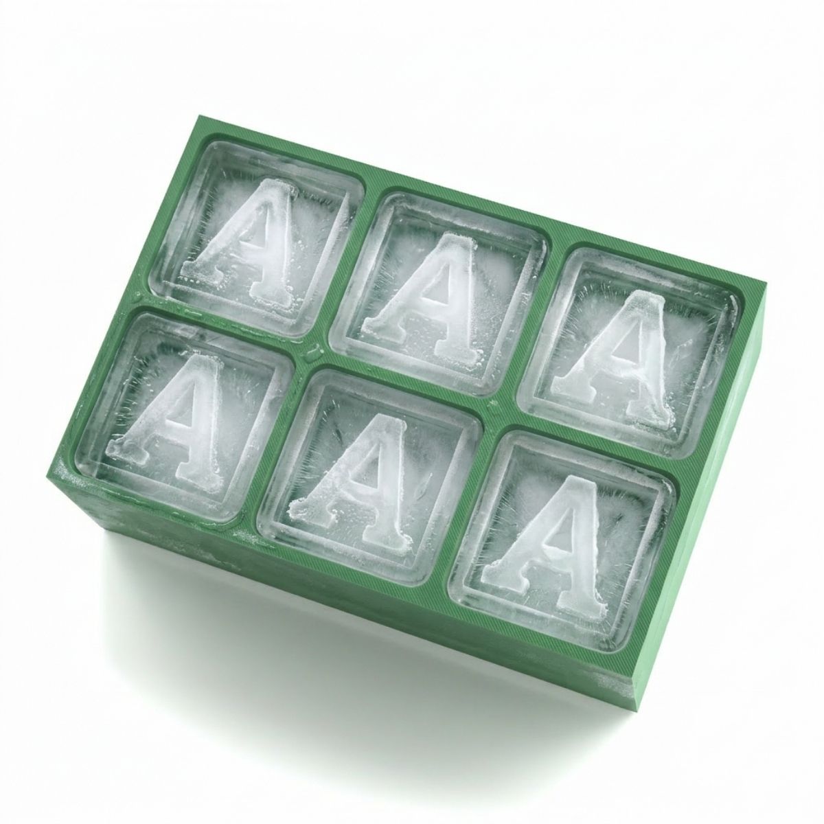 Nature-inspired green tray forming A-shaped ice cubes, perfect for Earth-conscious celebrations and heartfelt gifts.