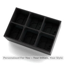 Sleek black JD initials ice tray in platinum silicone. Makes six bold 45 mm cubes, a striking gift for whisky and cocktails.