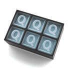 Sleek black ice tray forming Q-shaped cubes – ideal for birthdays or thoughtful presents