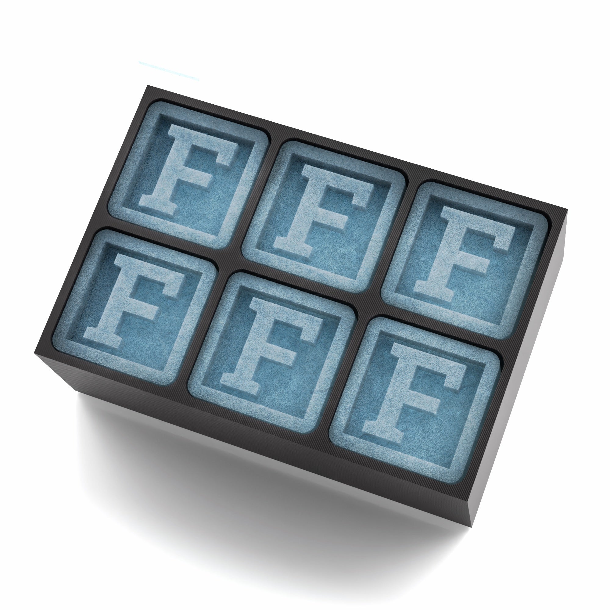 Handmade black silicone ice tray with six large F cubes, perfect for unique gifts, men’s barware, and celebrating special occasions.