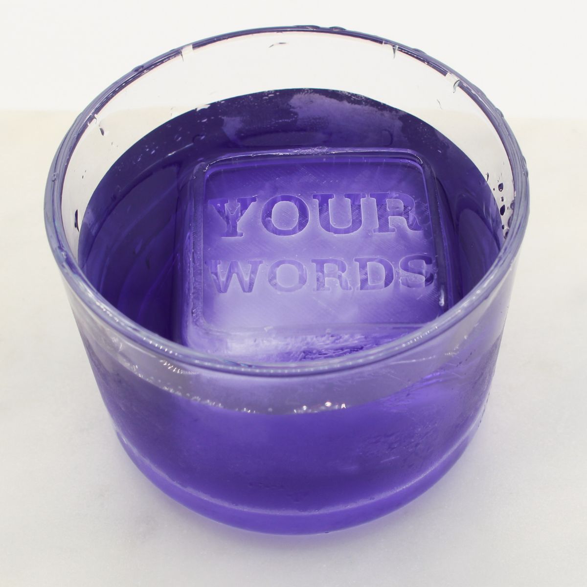 A cube showcasing YOUR WORDS, designed to highlight how any phrase or message can be turned into a unique ice design. Perfect for gifting, events, and celebrations.