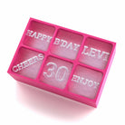 Pink custom ice tray with raised ice text: HAPPY B'DAY LEVI, 30, CHEERS, ENJOY – quirky 30th gift for loved ones