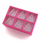 Bright pink tray creating six personalised A ice cubes, made for birthdays, pamper nights, or meaningful surprises.