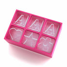 Bright pink ice tray featuring custom 'A' letters, a heart, star, and flower – the perfect personalised touch for drinks or chocolate gifts