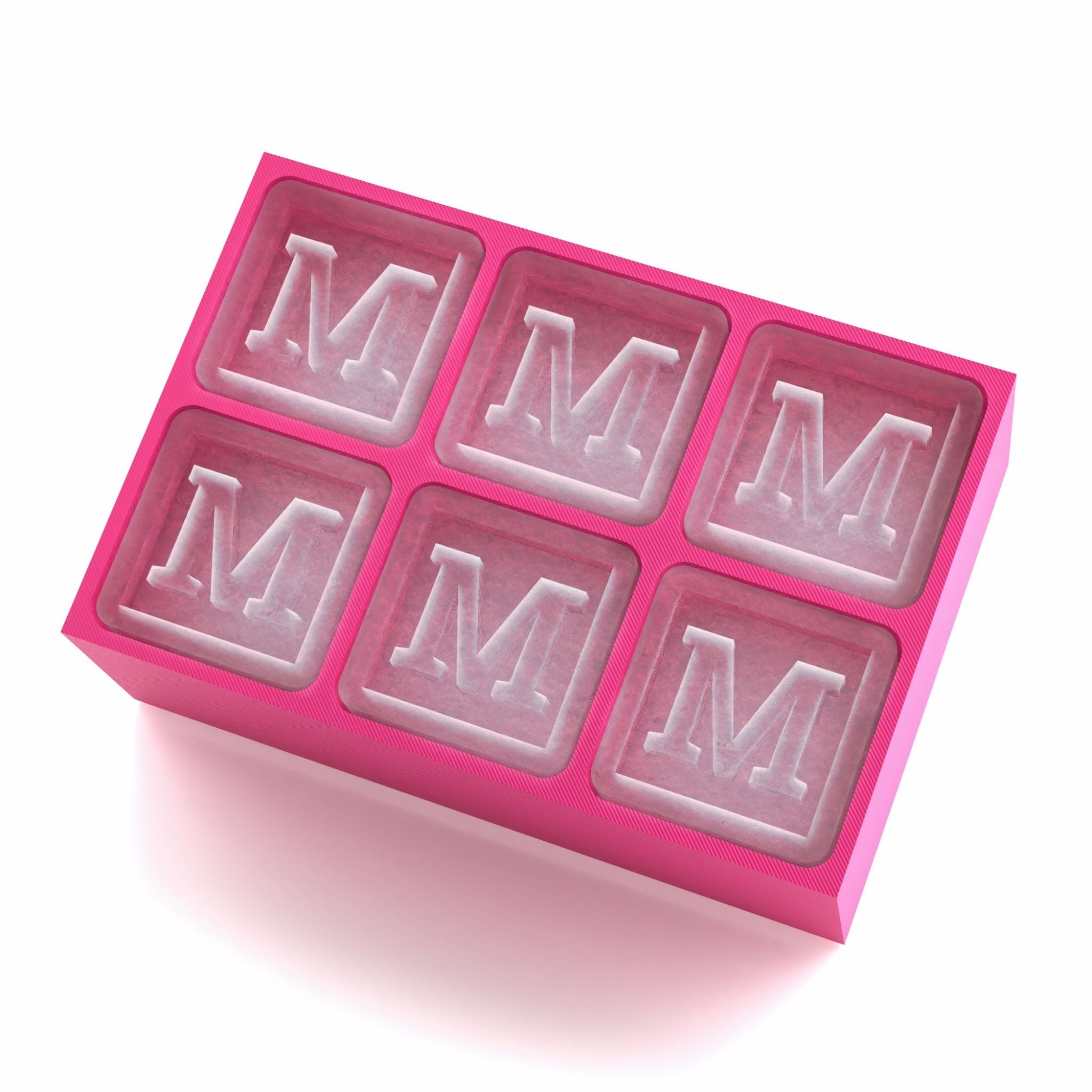 Chic pink silicone ice tray with six M monogram cubes, thoughtful custom gift for birthdays, anniversaries, or special occasions.