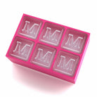 Charming pink ice cube tray with raised M lettering – for heartfelt custom gifting