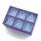 Purple silicone ice mould with 'BDAY21' engraving, designed for vibrant birthday celebrations.