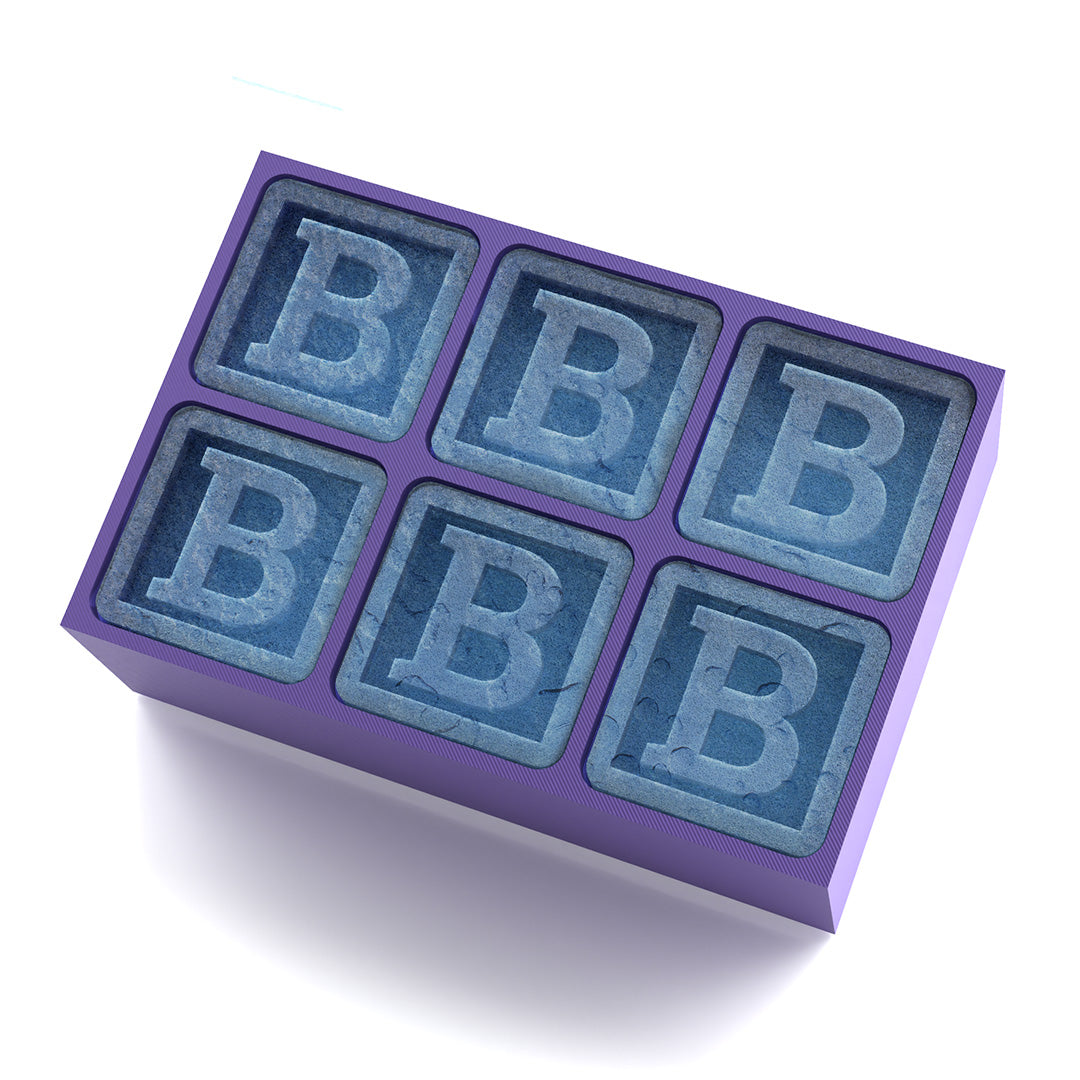 Custom purple tray moulds six bold B ice cubes – perfect for birthdays, milestone celebrations, and heartfelt gifting.