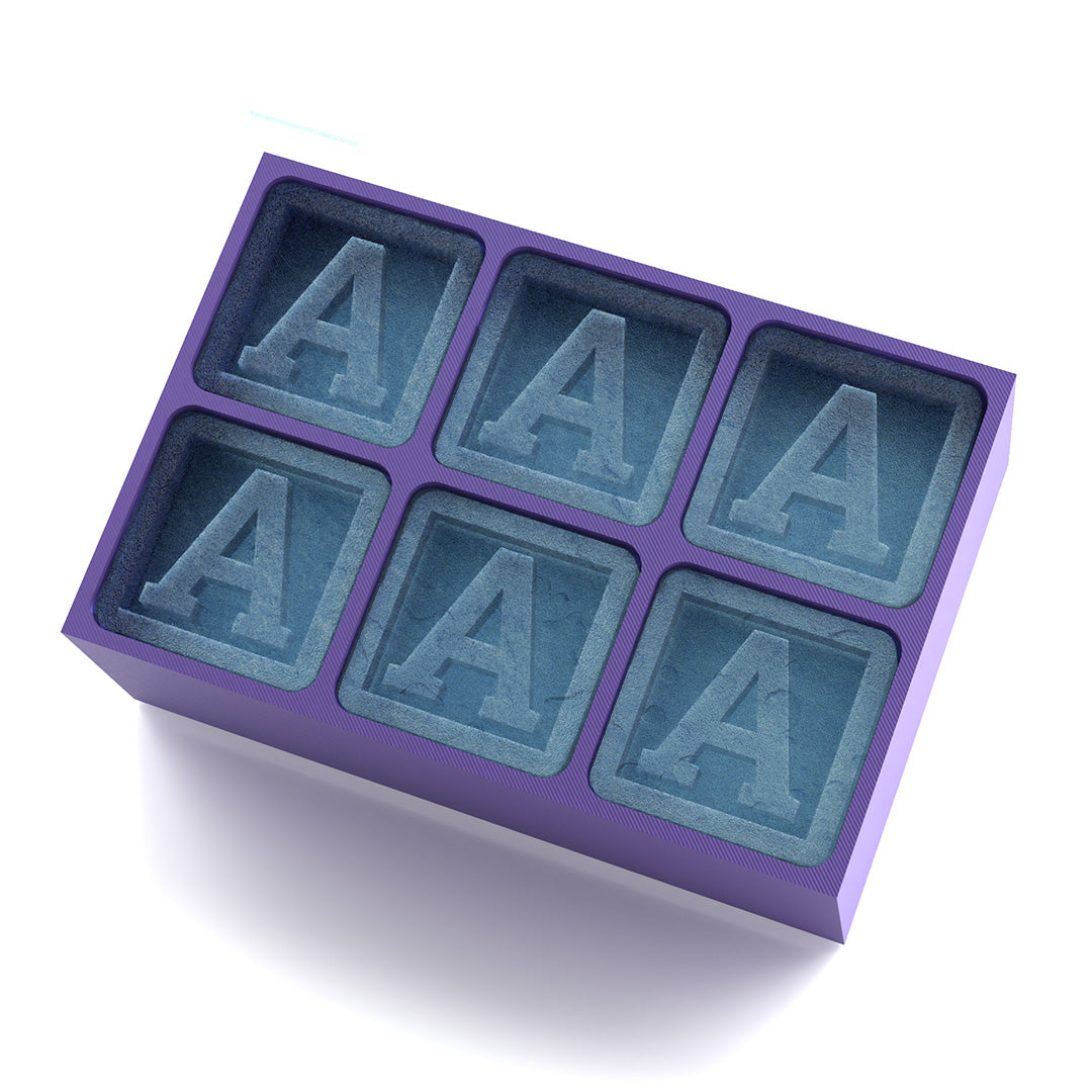 Purple ice tray forming A-shaped ice cubes, ideal for special events, gifts, and memorable parties