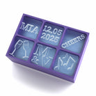 Purple wedding-themed ice cube tray showing personalised initials, toast glasses, and cheerful text, a charming wedding reception touch