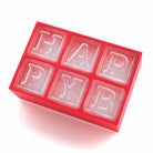 Red silicone ice tray showcasing 'HAPPYB' letters, ideal for bold birthday parties and personalised drinks.