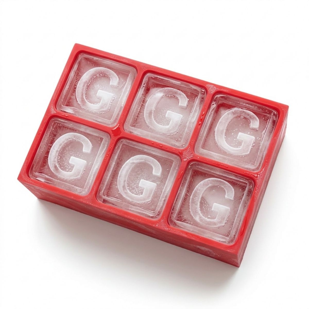 Bold red ice tray with six G monogram cubes – a striking, personalised gift for milestone birthdays and anyone who loves making a statement with their drinks.