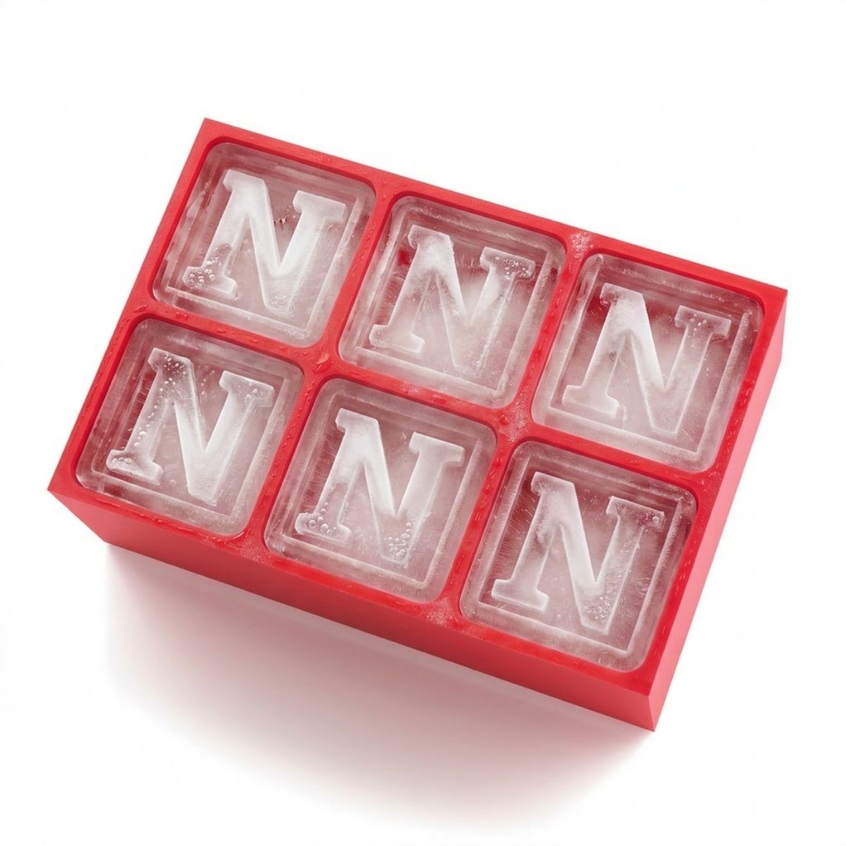 Bold red ice tray with six custom cubes, each marked with a raised letter N. Perfect for birthdays, anniversaries, or unique Australian-made gift ideas.