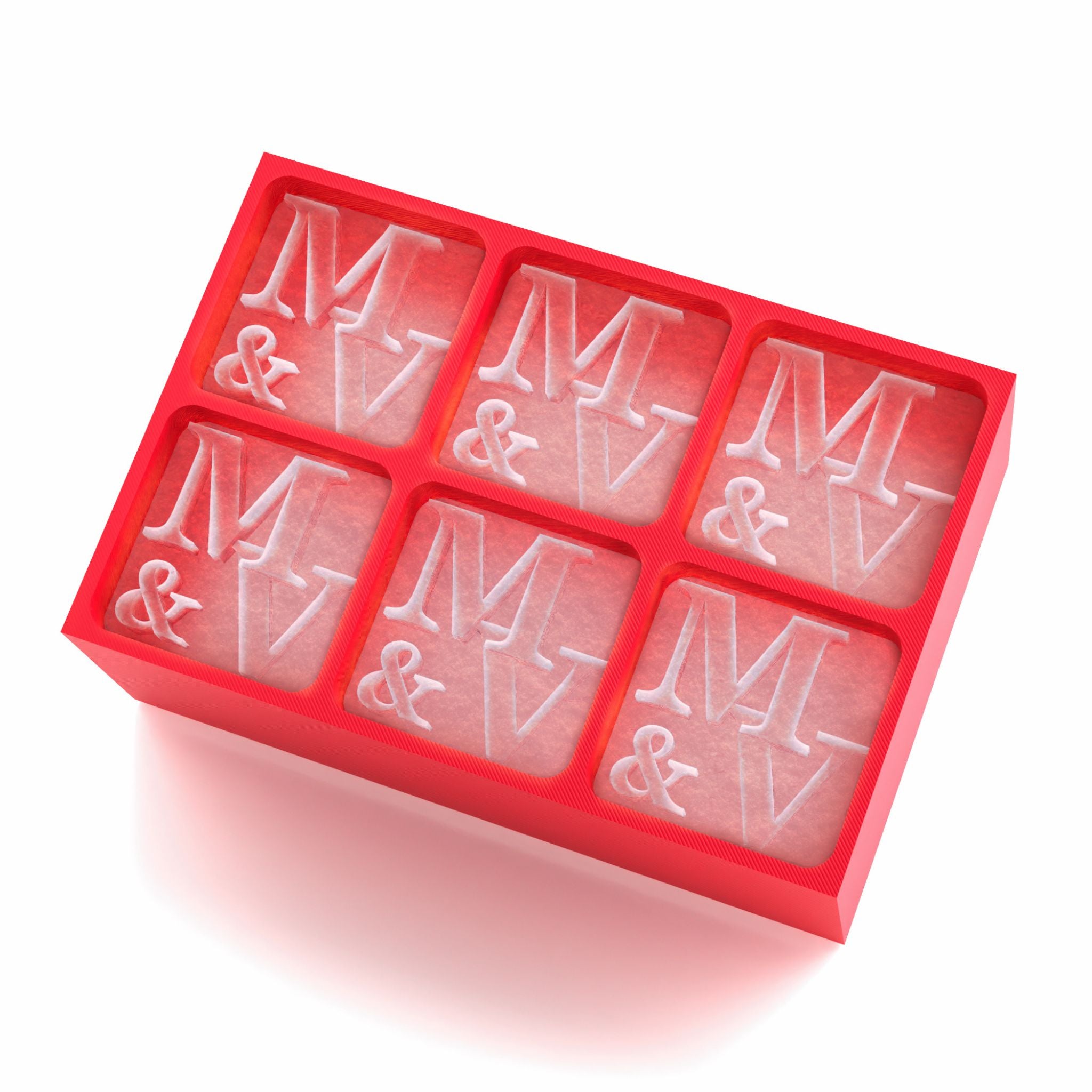 Vivid red silicone tray with M & V raised letters frozen in each cube, perfect for gifting