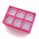 Pink silicone ice tray spelling “ENGAGE,” ideal for sweet, feminine engagement parties or proposal celebrations.