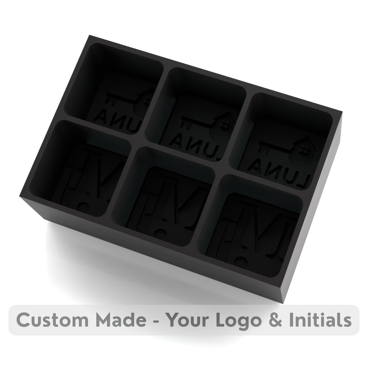 Matte black silicone ice tray showing engraved initials and logo impressions, ideal for premium gifting or corporate branding.