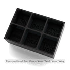 Sleek black platinum-silicone ice cube tray for personal messages, lets you freeze unique words into large cubes — handmade gift made in Australia.