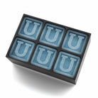 Black silicone ice tray with six raised U letter cubes, modern and stylish – perfect for gifting to men, milestone birthdays, or adding a personal touch to any barware set.