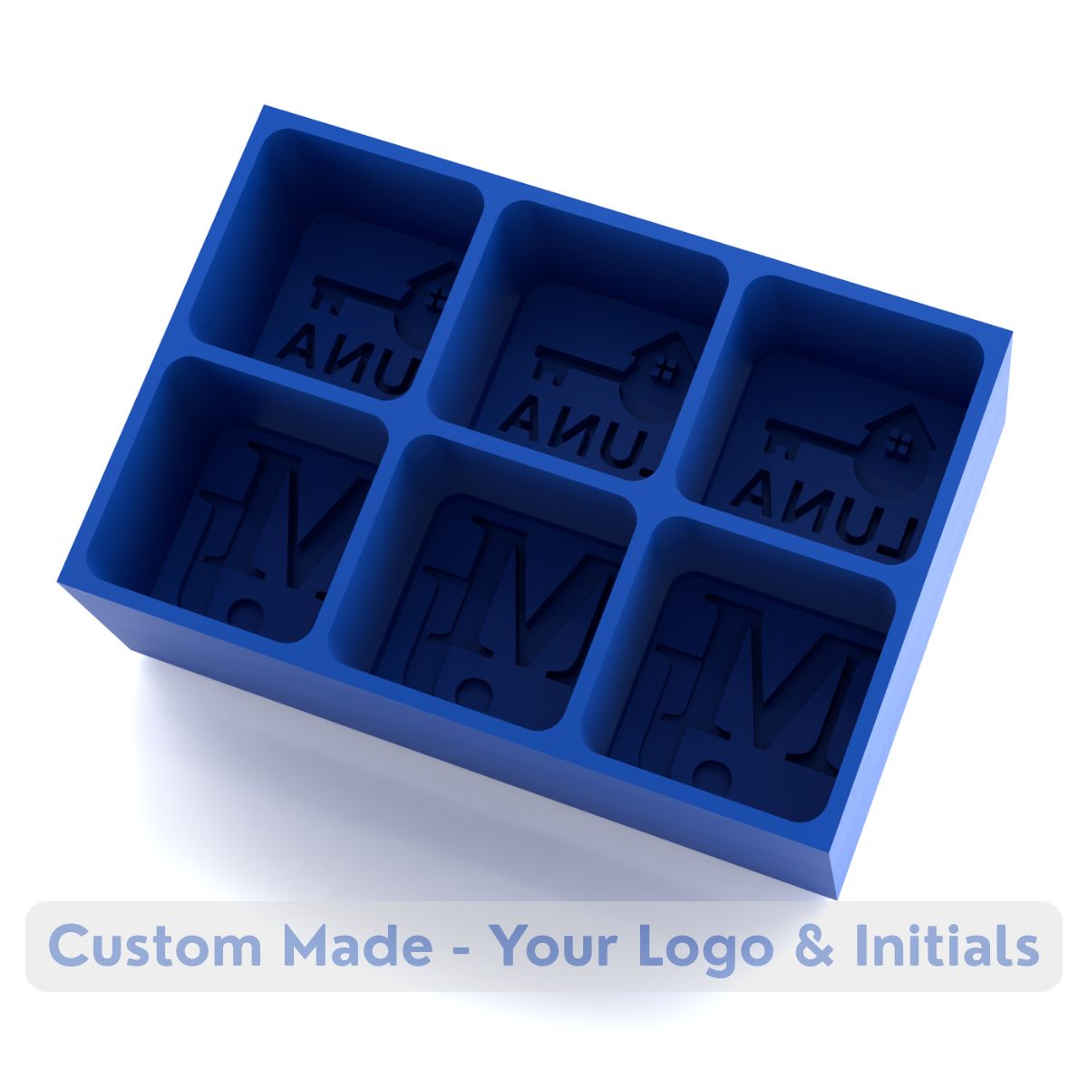 Close-up of a royal blue silicone ice tray featuring monogrammed initials and custom logo cavities for unique personalised ice cubes.