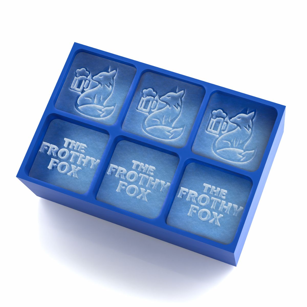Branded logo ice cubes in a royal-blue 6-cube tray — “The Frothy Fox” fox-and-beer logo and wordmark, 45 mm cubes for bar service.
