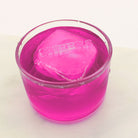 A bright pink drink featuring a raised “CHEERS” ice cube, ideal for party toasts, events, and colourful cocktail moments.