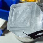 High-detail close-up of custom letter Z ice cube with visible texture and clarity