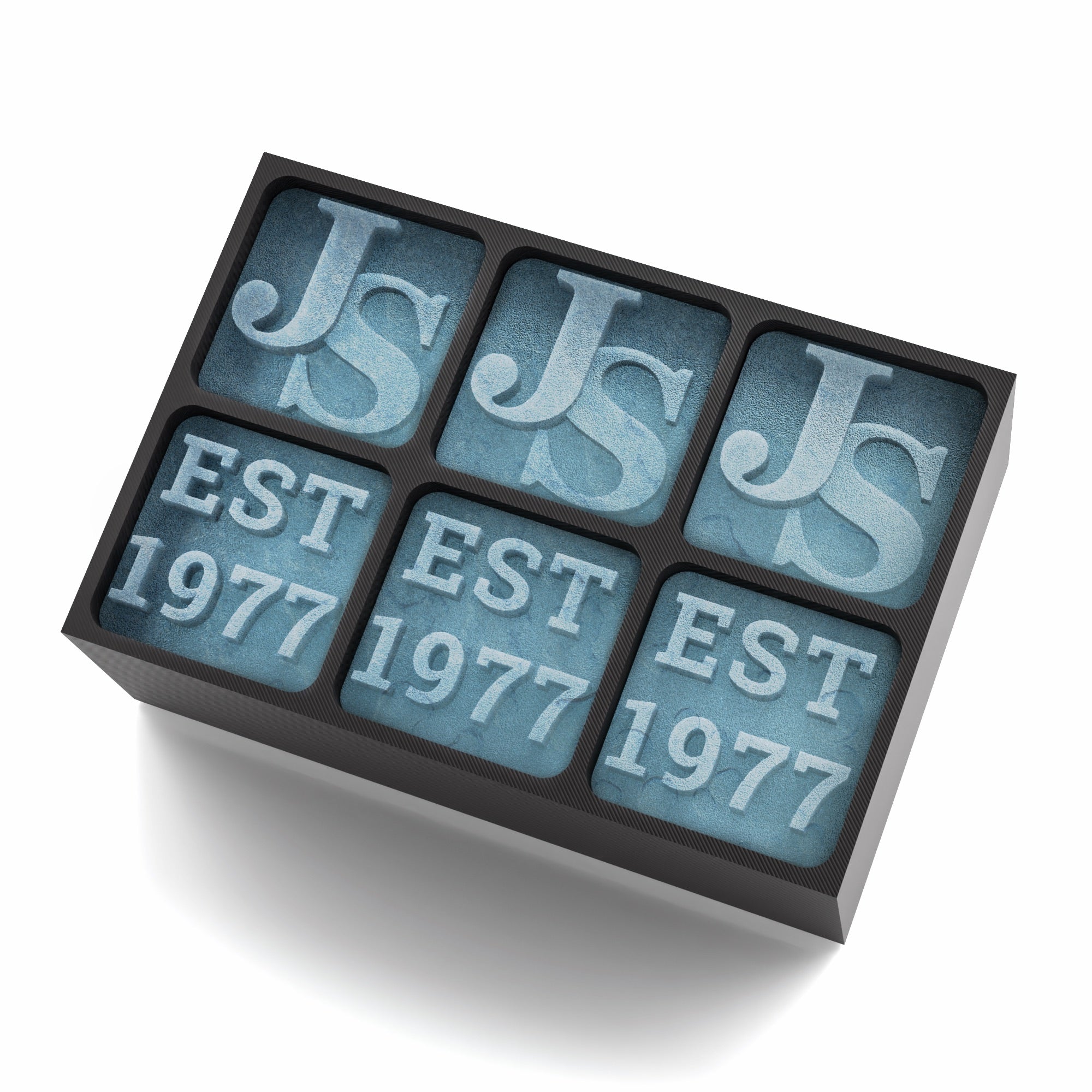 Black engraved ice tray with JS initials and EST 1977 frozen in each cube – a striking personalised gift for milestone celebrations or Father’s Day.
