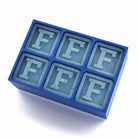 Blue silicone ice cube tray with six large cubes each featuring the letter F, perfect for men’s gifts and celebrations