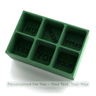 A green silicone ice tray with six deep cavities ready for your custom wording, ideal for home bars and heartfelt gifts.