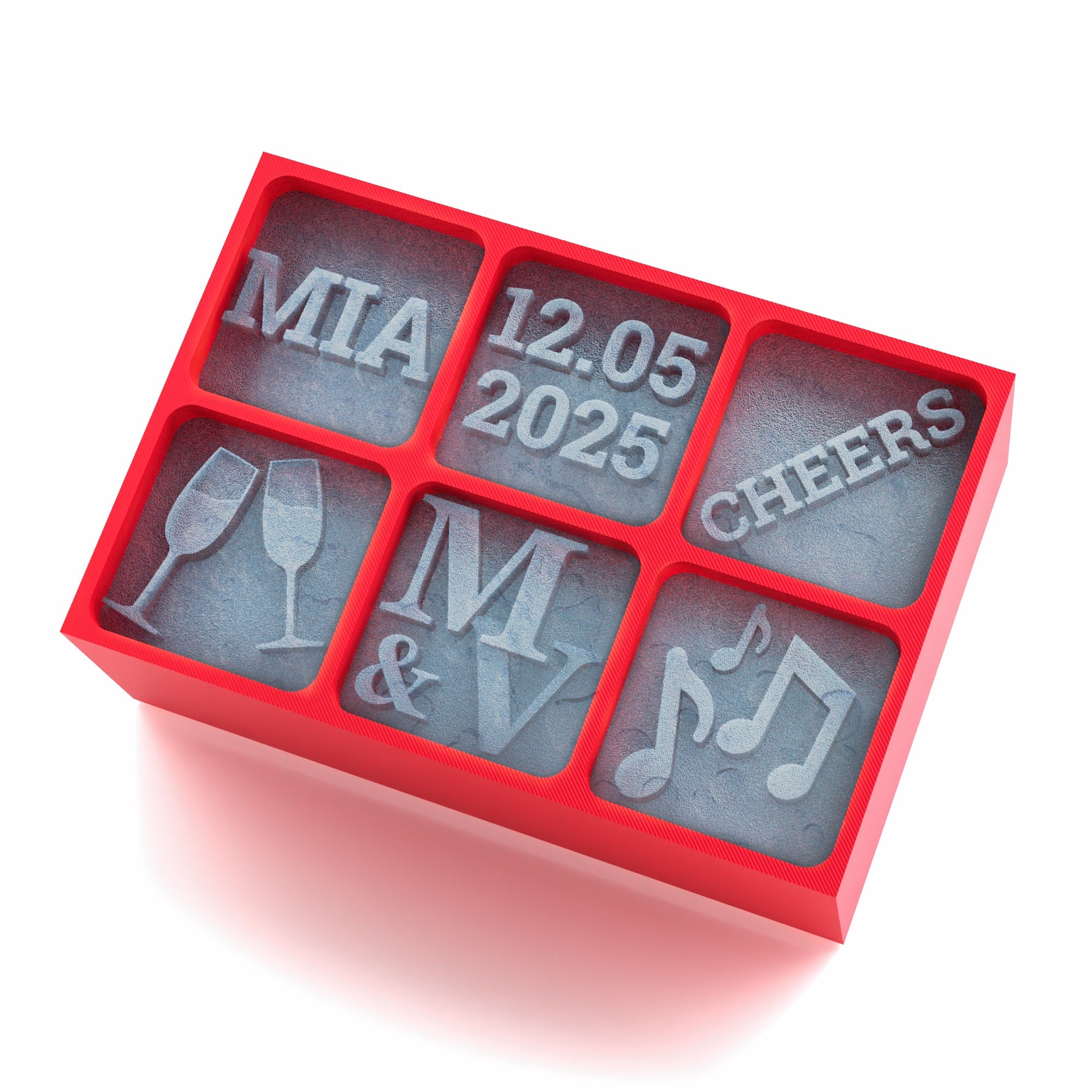 A red 6-cube silicone ice tray with custom designs including a name (MIA), a date (12.05.2025), word 'CHEERS', champagne glasses, initials (M & V), and music notes. Perfect for weddings, celebrations, or anniversaries.