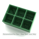 Handmade green silicone ice cube tray with reversed word impressions, personalised mould for freezing names or short phrases into ice cubes, made in Australia.