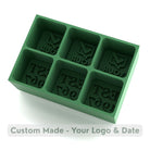 Green custom ice cube tray featuring YOUR LOGO and EST date text compartments for personalized anniversary ice