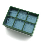 Engraved green silicone ice tray displaying the Wilson name, crest, and monogram initials – crafted to celebrate family roots and fatherly pride.