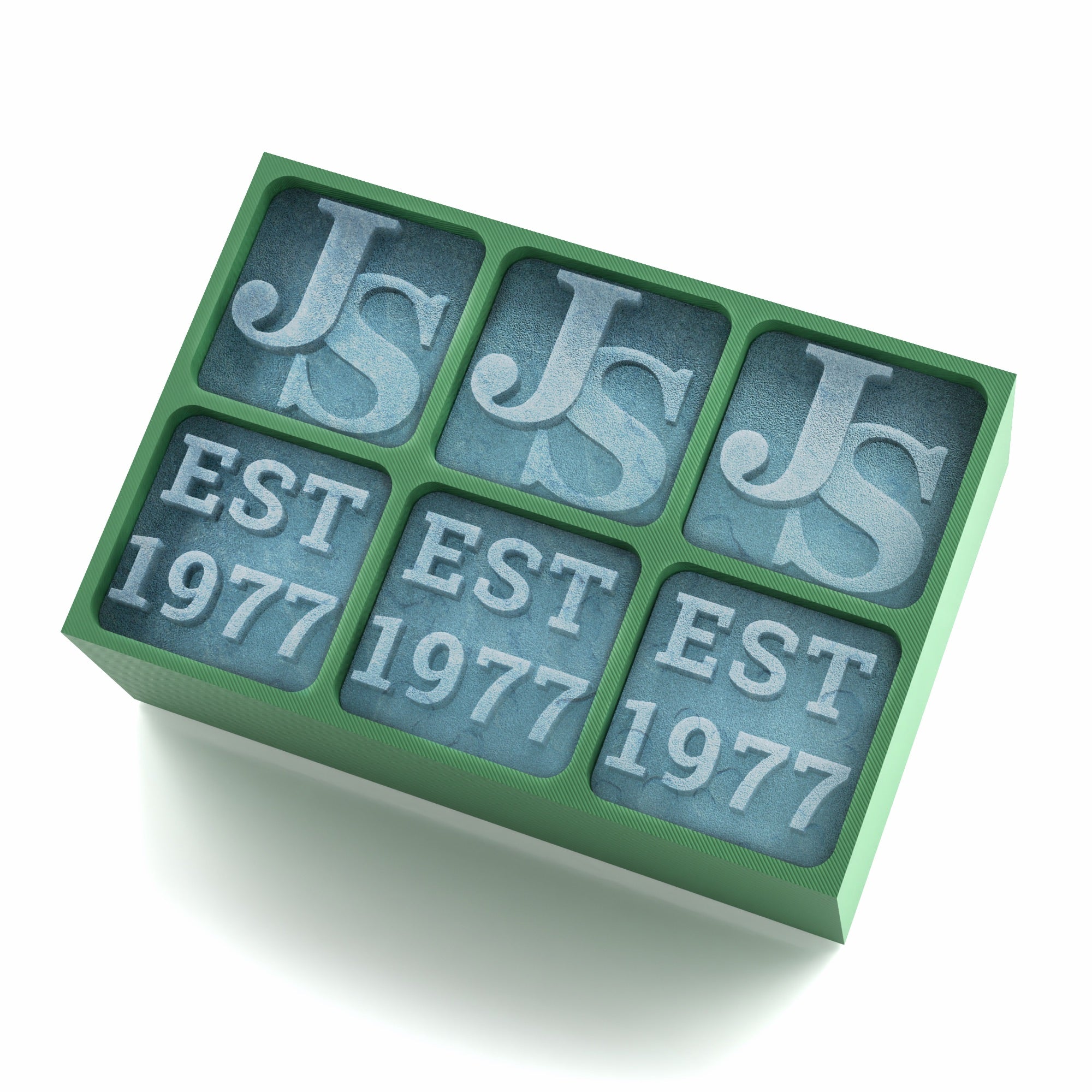 Green silicone ice tray engraved with JS and EST 1977 – ideal for honouring someone’s birth year with a personalised touch in every pour.