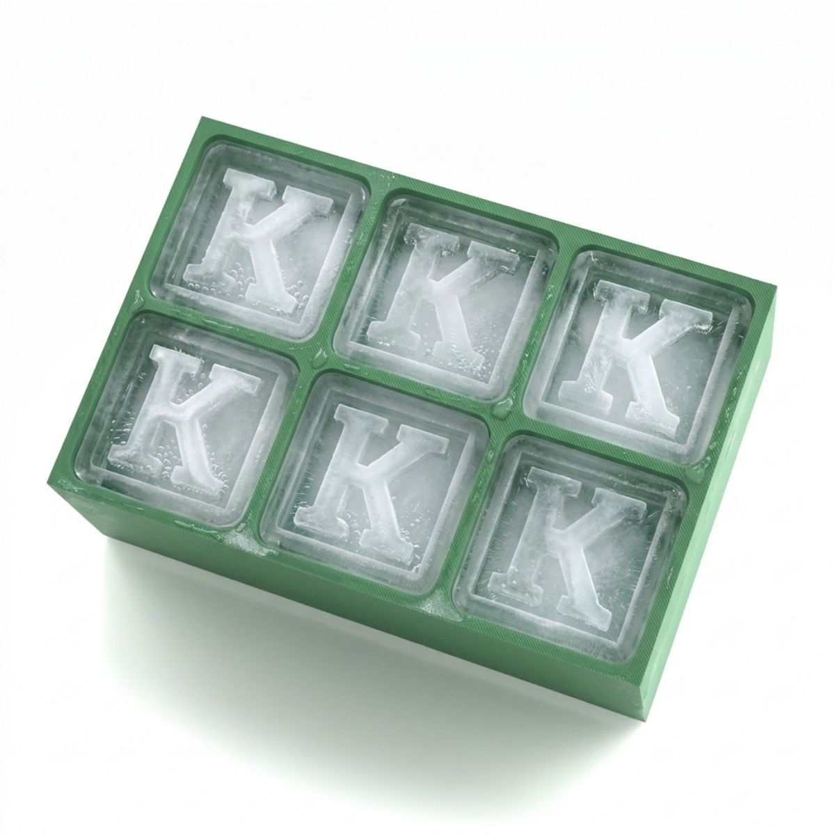 Vibrant green ice tray with large letter K cubes, ideal for adding a personal touch to parties, cocktails, or as a memorable gift.