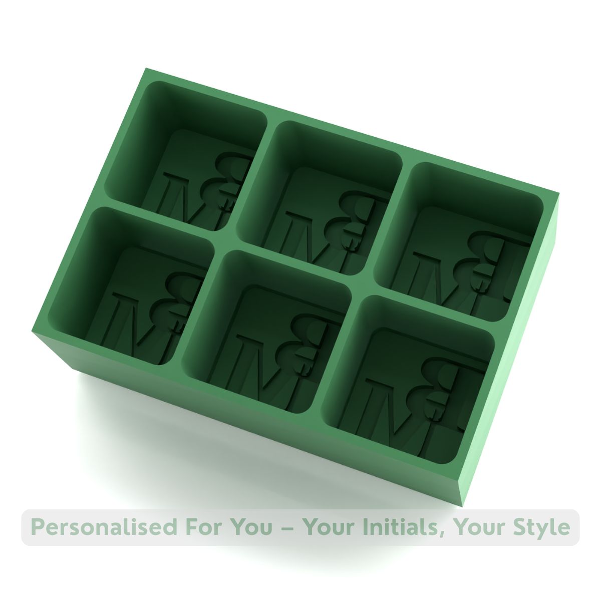 Forest-green silicone ice cube tray with six moulds featuring BM initials, premium handmade barware accessory for cocktails, whisky, and gifting.