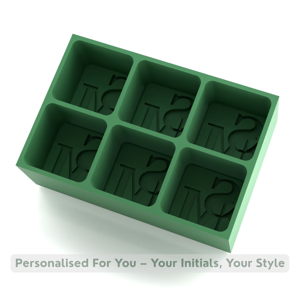 Forest-green silicone ice tray showing SM initials across six cube moulds, a premium handmade bar accessory for cocktails, whisky, and gifting.