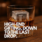 Ultra-realistic close-up of a whiskey glass with amber liquor and a bold, square ice cube featuring a raised letter 'L', perfect for high-end gifting moments.
