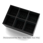 Matte-black silicone tray creating six crisp text cubes for names, dates or fun slogans – perfect for milestone toasts.