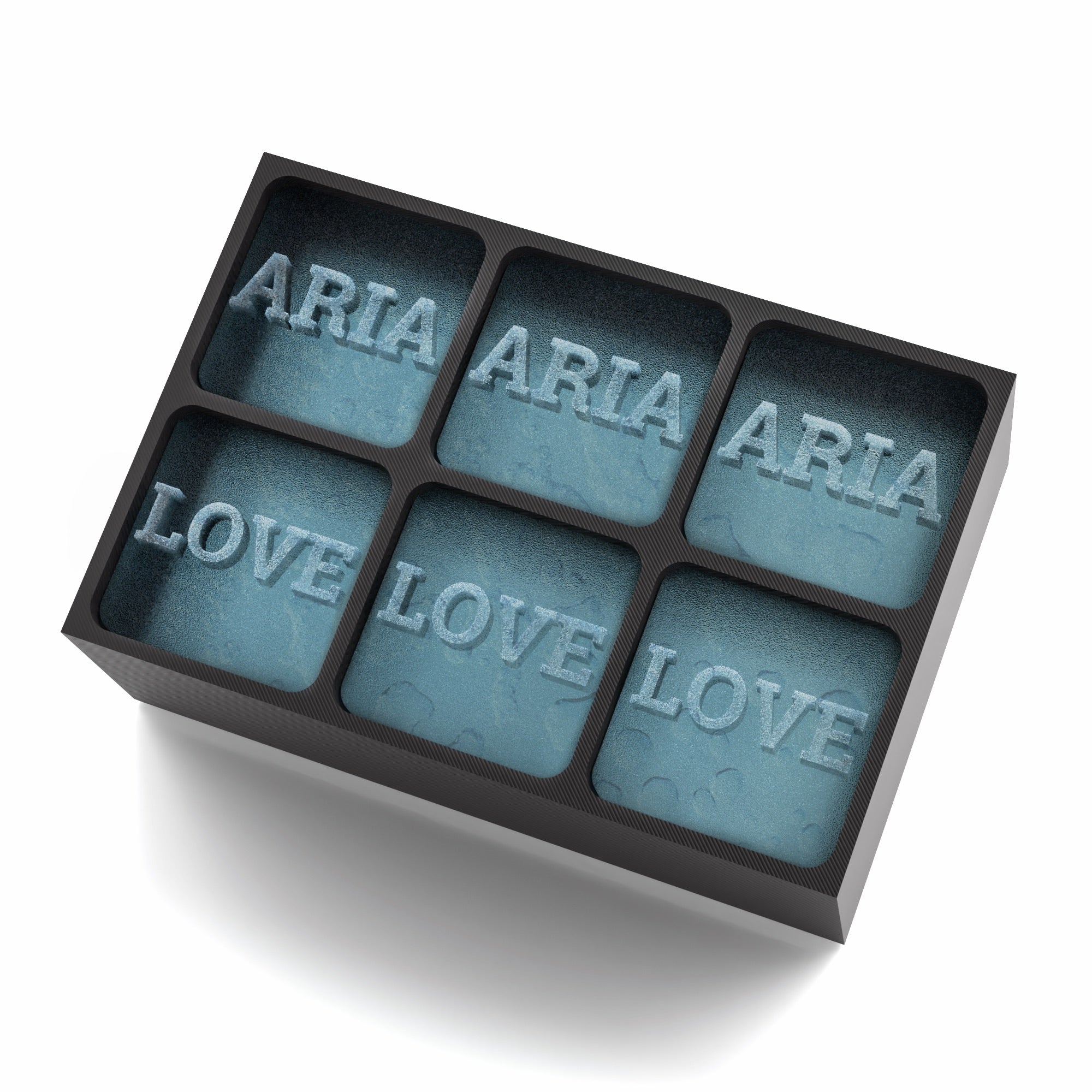 Custom black ice tray with ARIA and LOVE text frozen into large ice cubes – perfect for meaningful gifts.