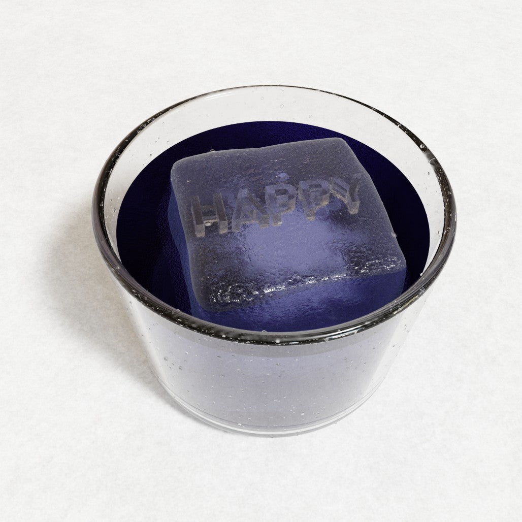 Purple beverage with a large HAPPY ice cube created using a premium silicone mould, symbolising custom design and craftsmanship from Chilled Out Creations.